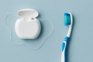 dental floss and a toothbrush