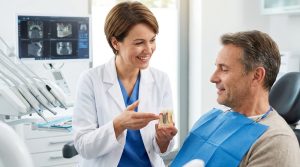 Doctor shows patient an important item.