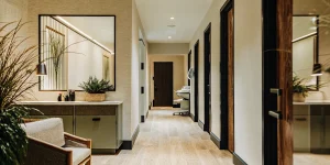 Modern dental office reception area with warm lighting and professional atmosphere