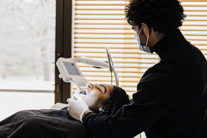 Dental implant procedure at Celebrity Smiles Melbourne with advanced technology in a comfortable dental office