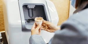 Modern dental crown milling machine and digital intraoral scanner in a high-tech dental office